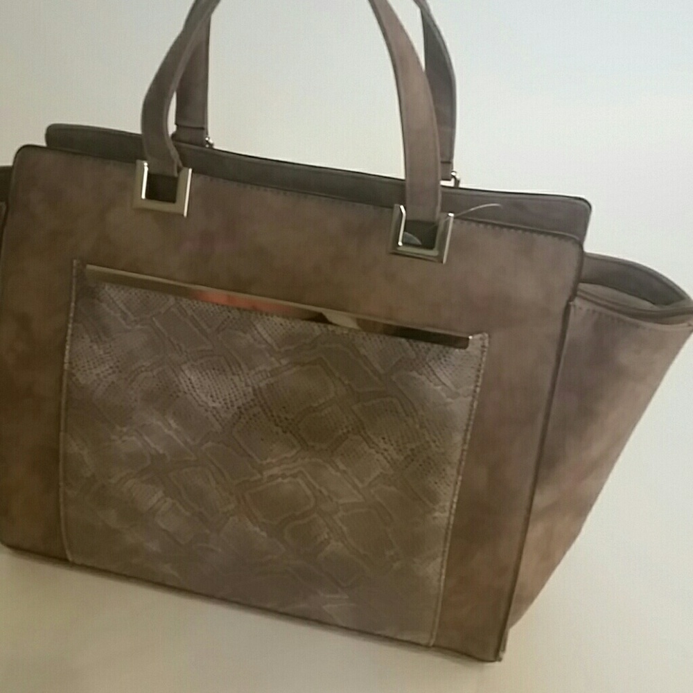 Tan with aligator pattern purse